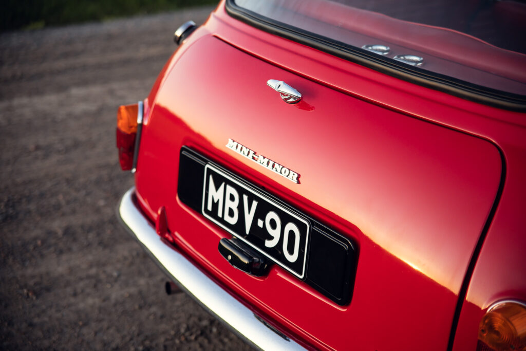 Red Mini Minor car rear view with license plate
