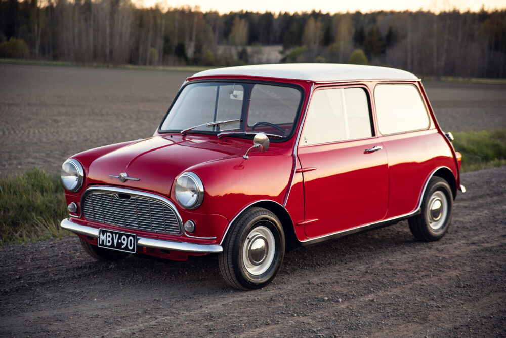 Vintage red Mini Cooper on countryside road