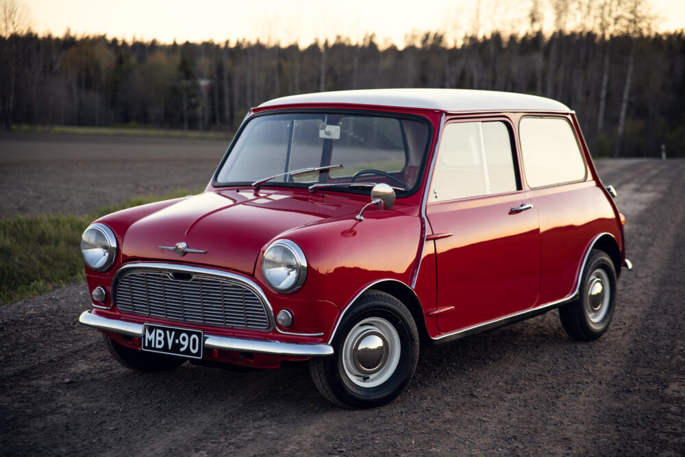 Vintage red Mini Cooper on a country road