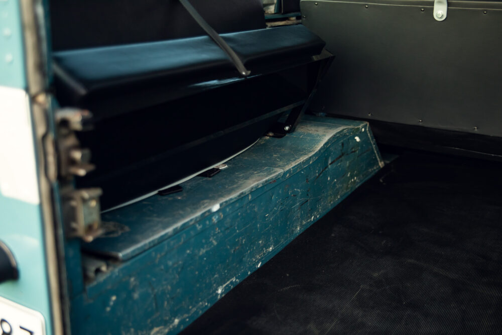 Vintage bus luggage compartment with open doors