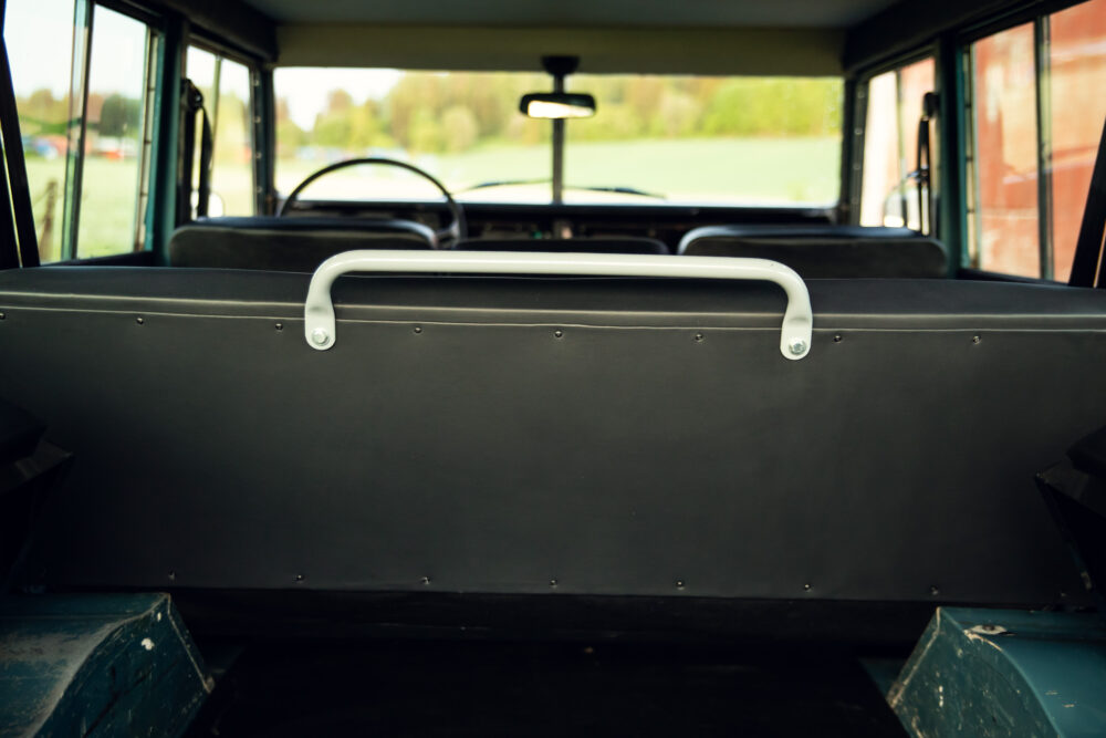 Interior view of vintage bus with focus on seat backs