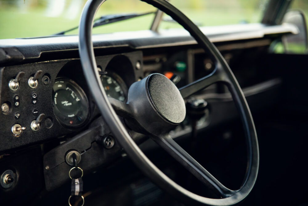 Vintage car dashboard and steering wheel close-up