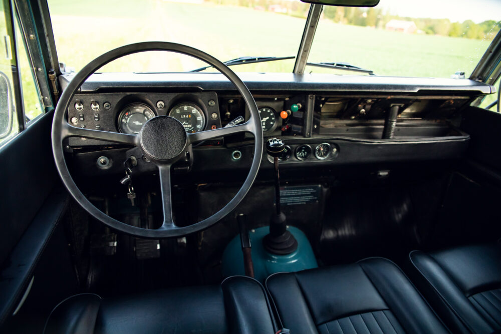 Vintage car interior with steering wheel and dashboard