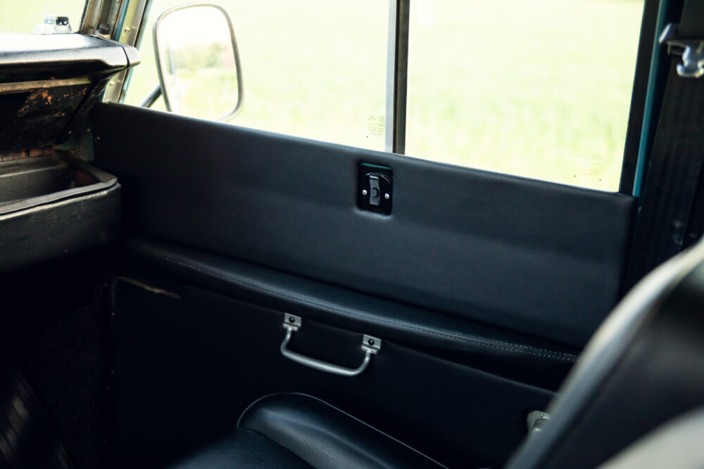 Vintage car interior with black leather seats