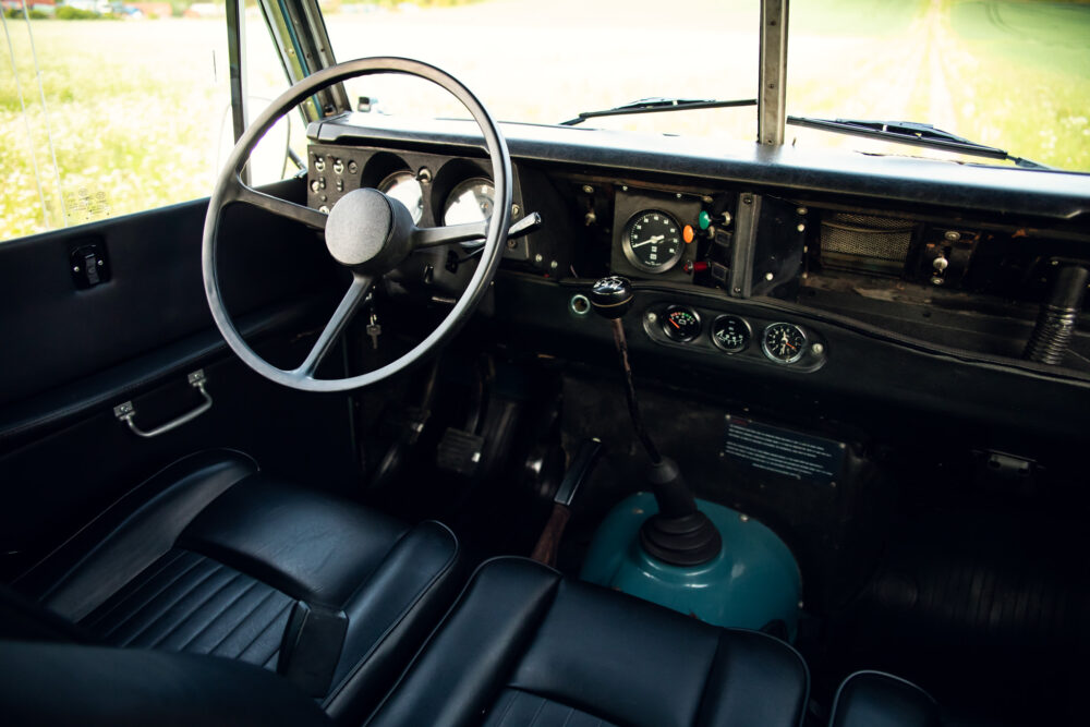 Vintage car dashboard and steering wheel interior view