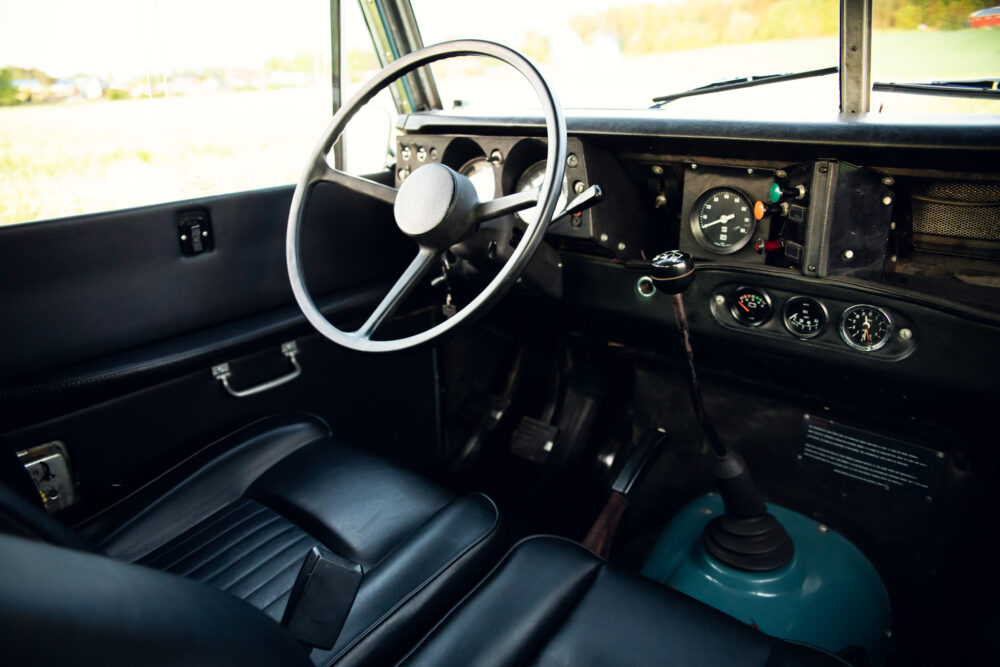 Vintage car interior with steering wheel and dashboard