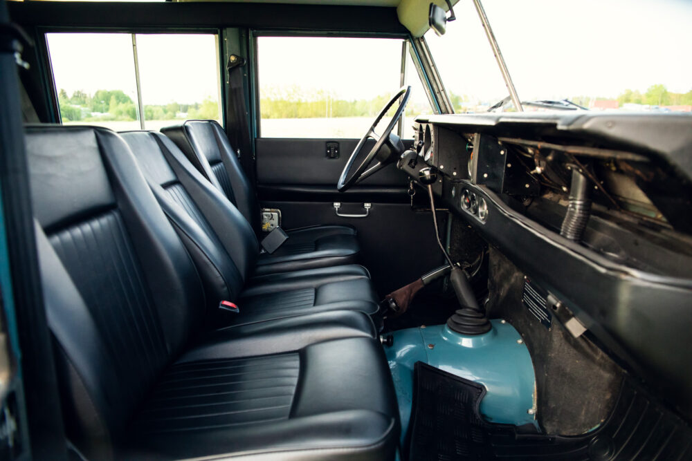 Vintage vehicle interior with black leather seats