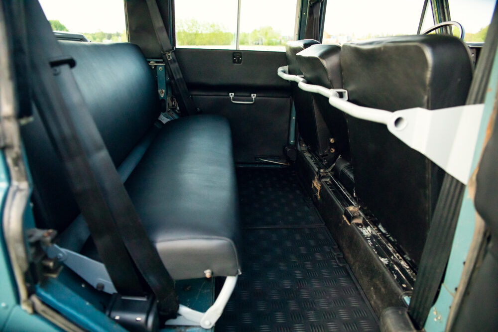 Vintage car interior with black leather seats