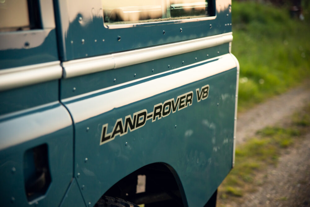Close-up of Land Rover V8 vehicle side panel