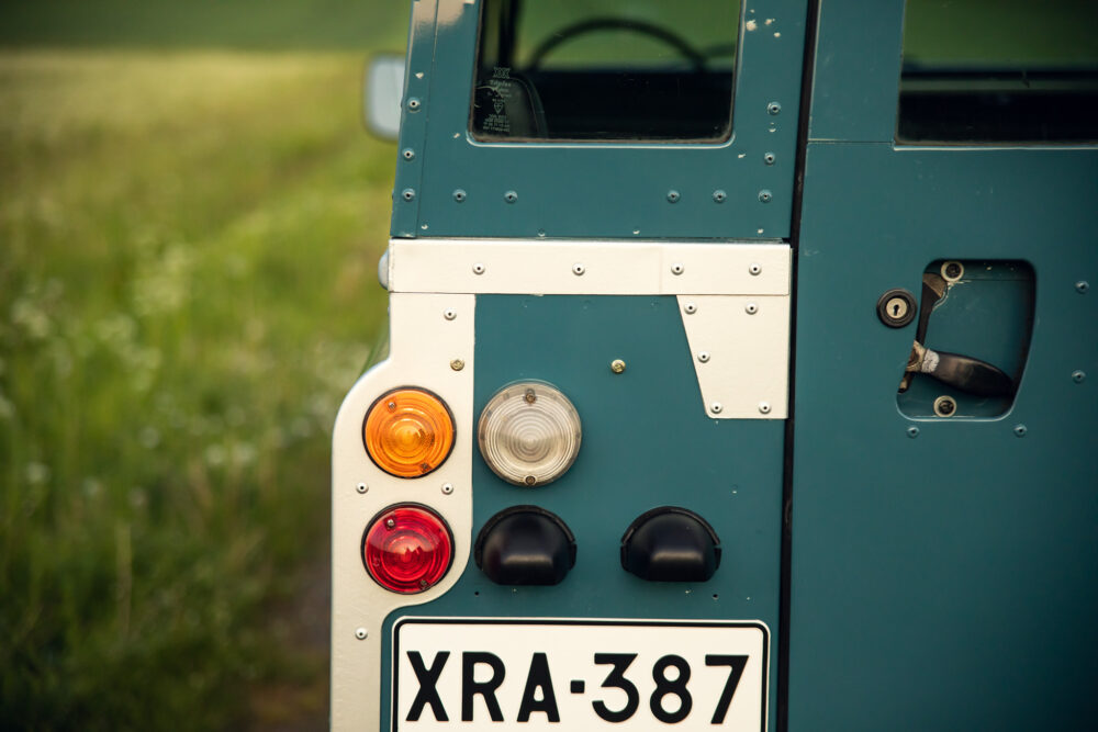 Close-up of vintage car's rear lights and license plate