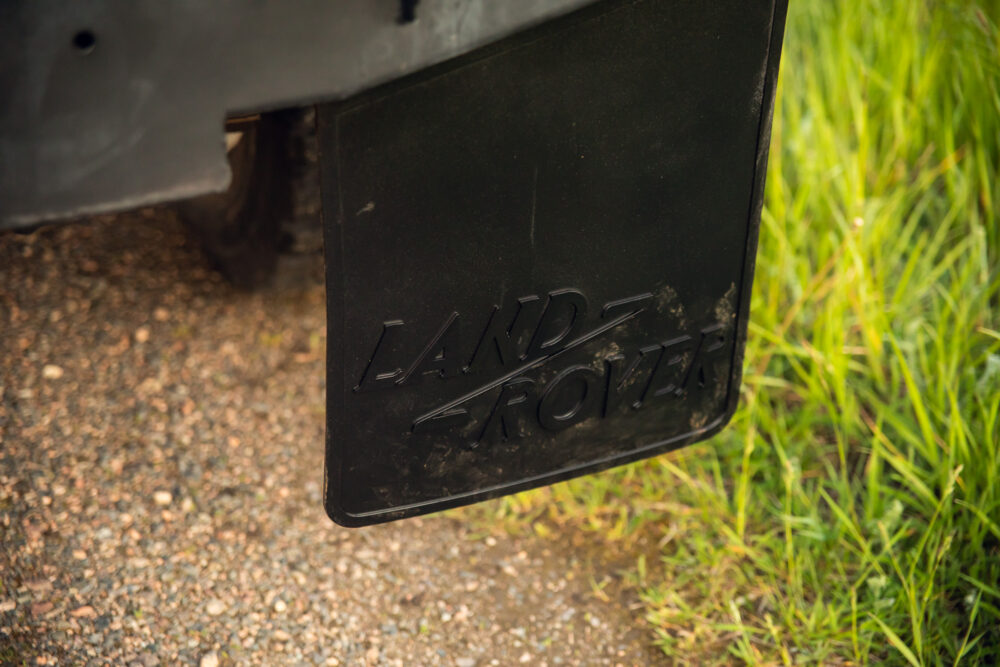 Muddy Land Rover logo on vehicle mud flap
