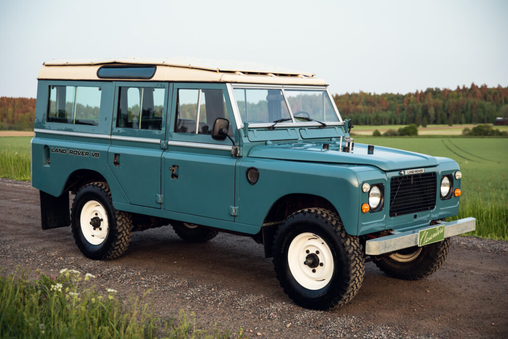 Vintage blue Land Rover V8 in countryside