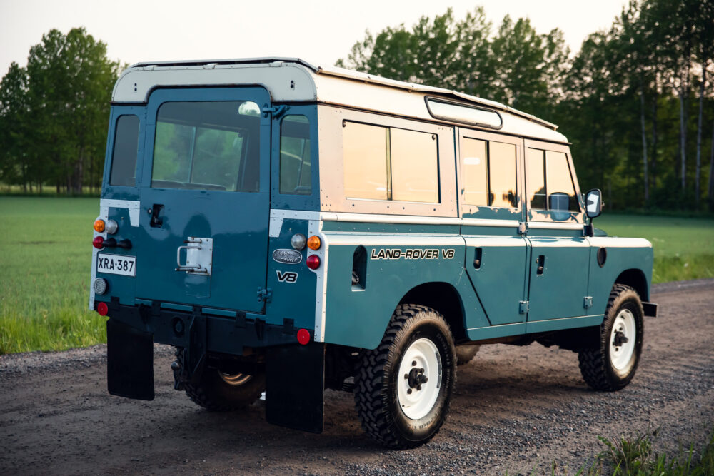 Vintage blue Land Rover V8 in rural setting
