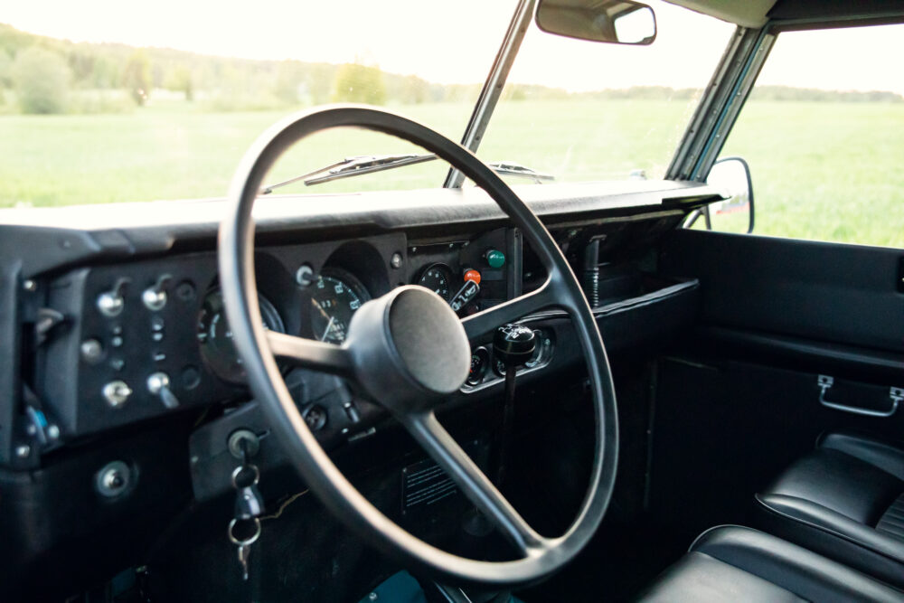 Vintage car interior with steering wheel and dashboard
