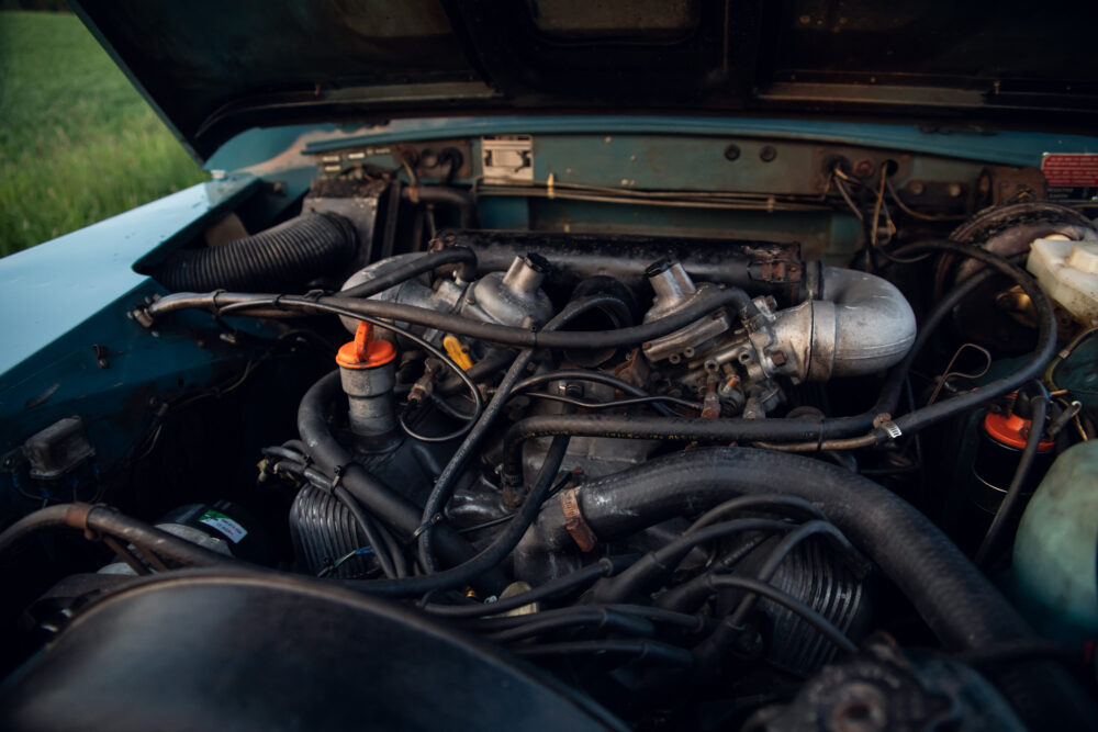 Detailed view of an old car engine compartment