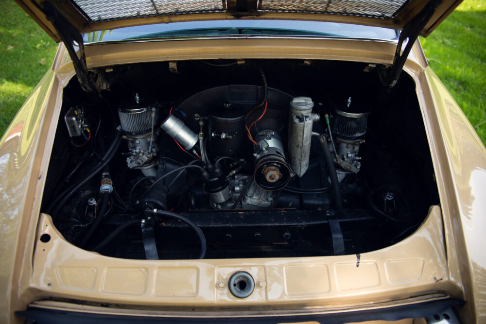 Vintage car engine bay open showing details