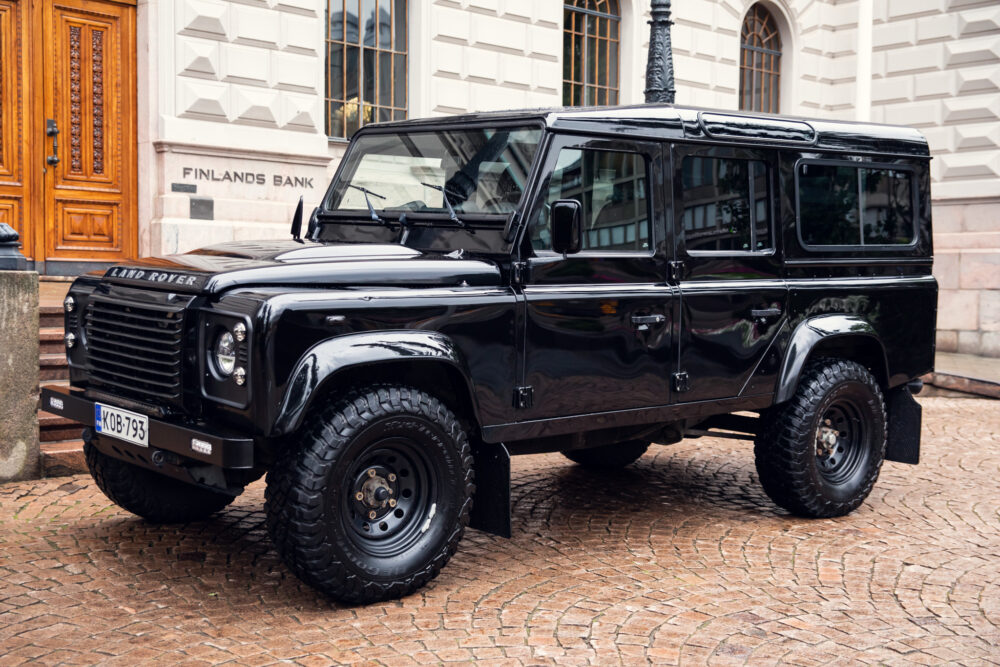 Black Land Rover Defender parked outside Finland's Bank
