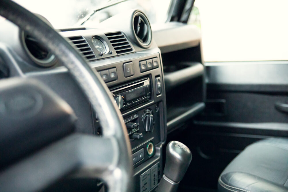 Close-up view of car's dashboard and gear shift