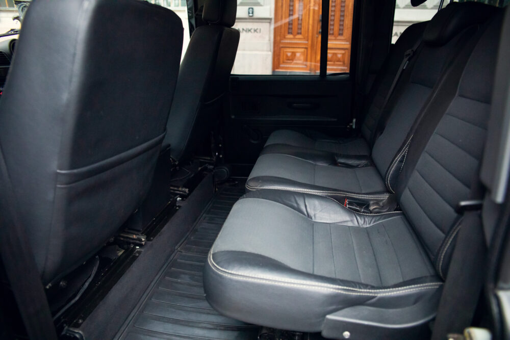 Interior view of black vehicle with leather seats