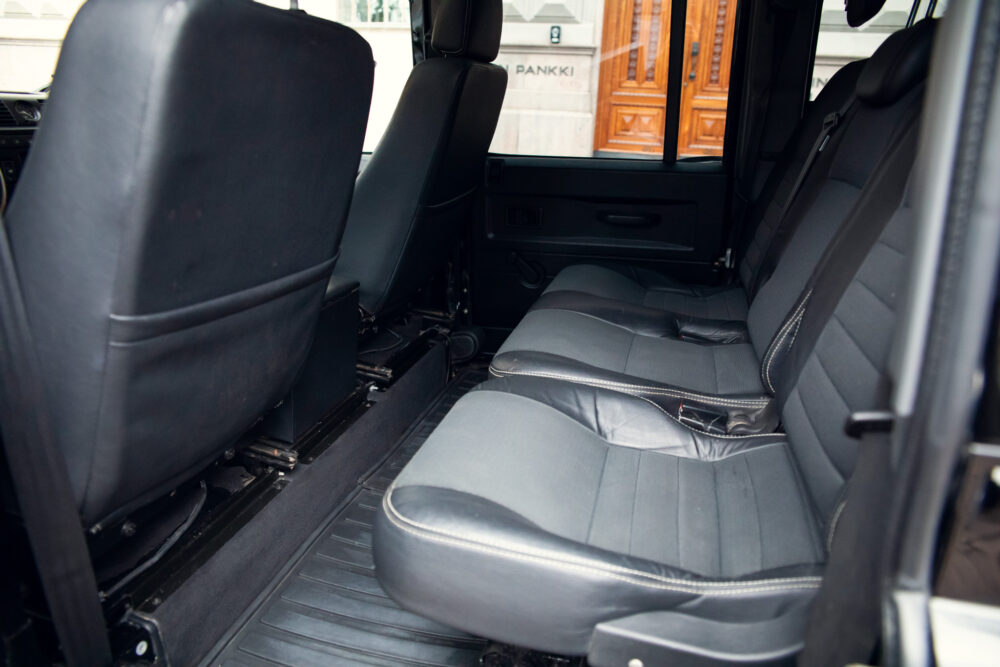 Interior view of a vehicle with black leather seats