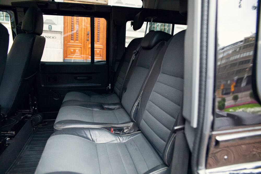 Open van door showing interior with leather seats