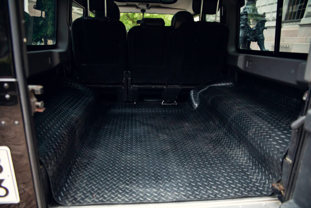Empty van interior with textured black floor
