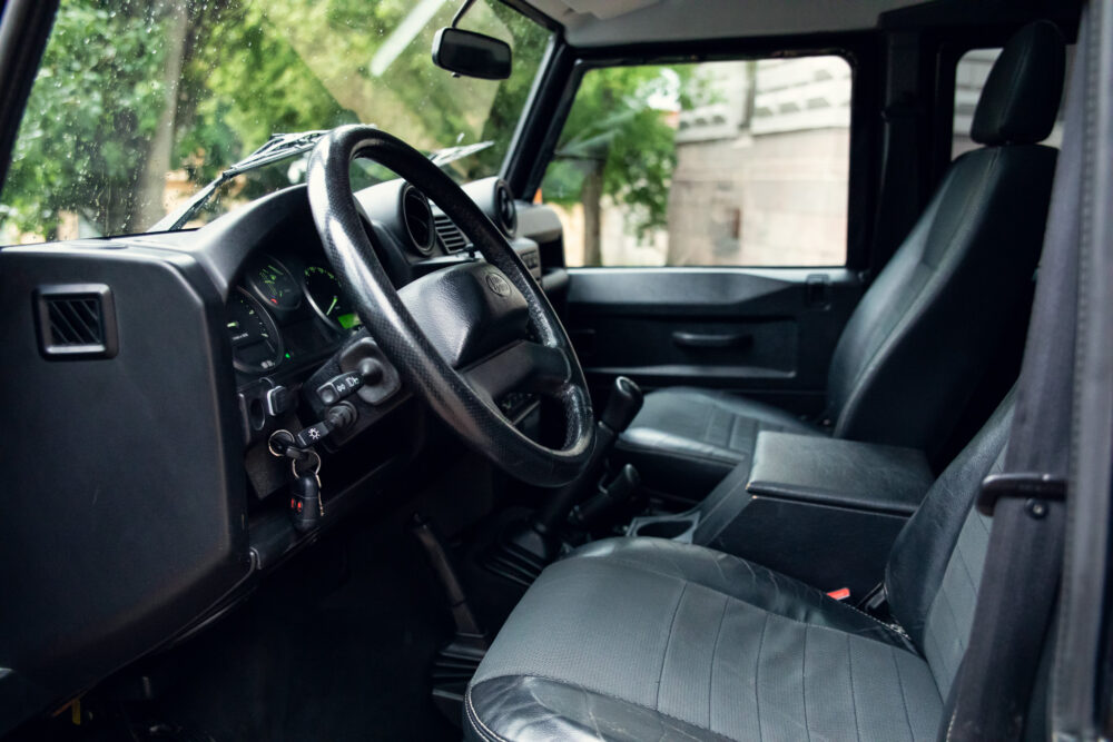 Interior view of modern SUV with black seats
