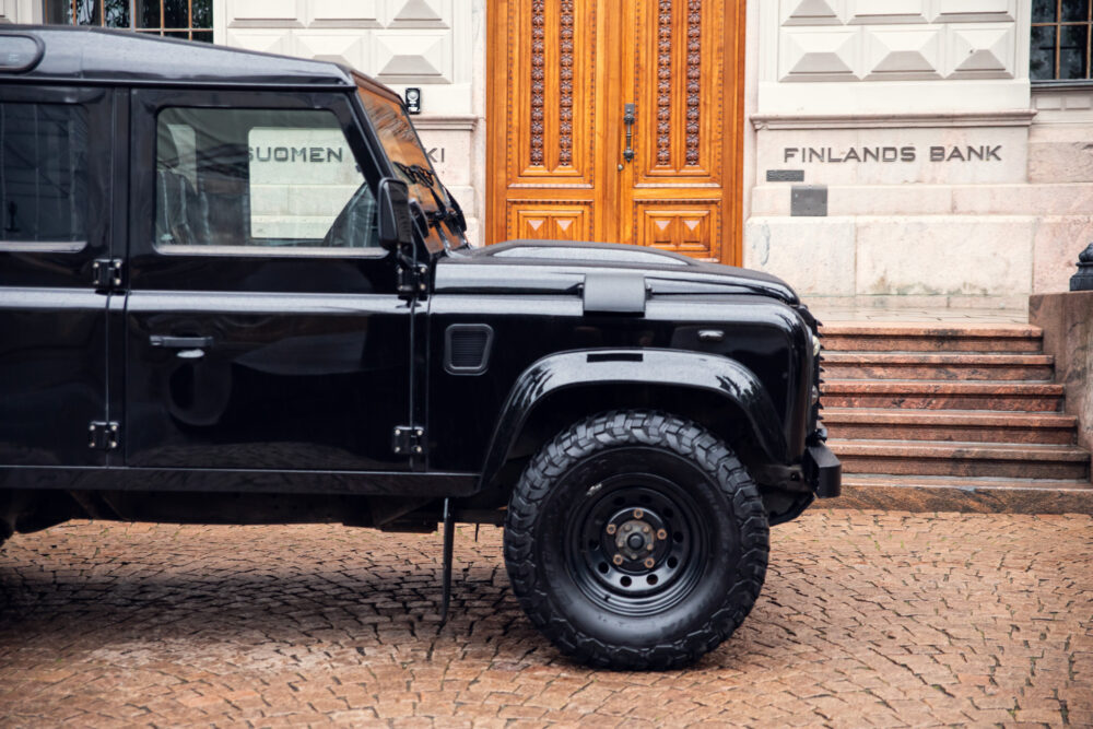 Black SUV parked in front of Finland's Bank