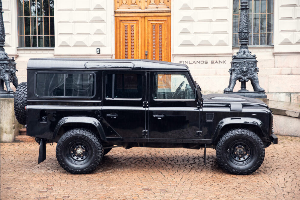 Black SUV parked in front of Finland's Bank