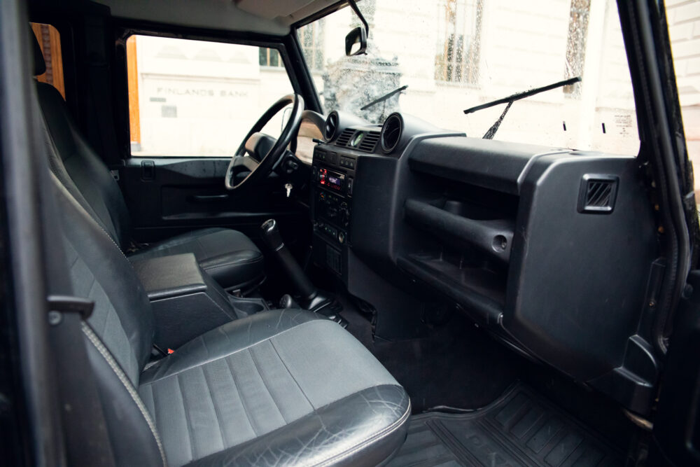 Interior view of a modern car dashboard and seats