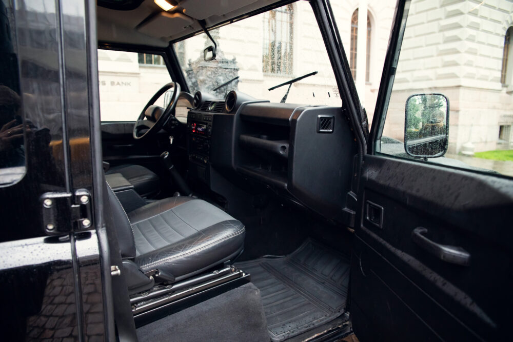 Interior view of vintage SUV, raindrops on window
