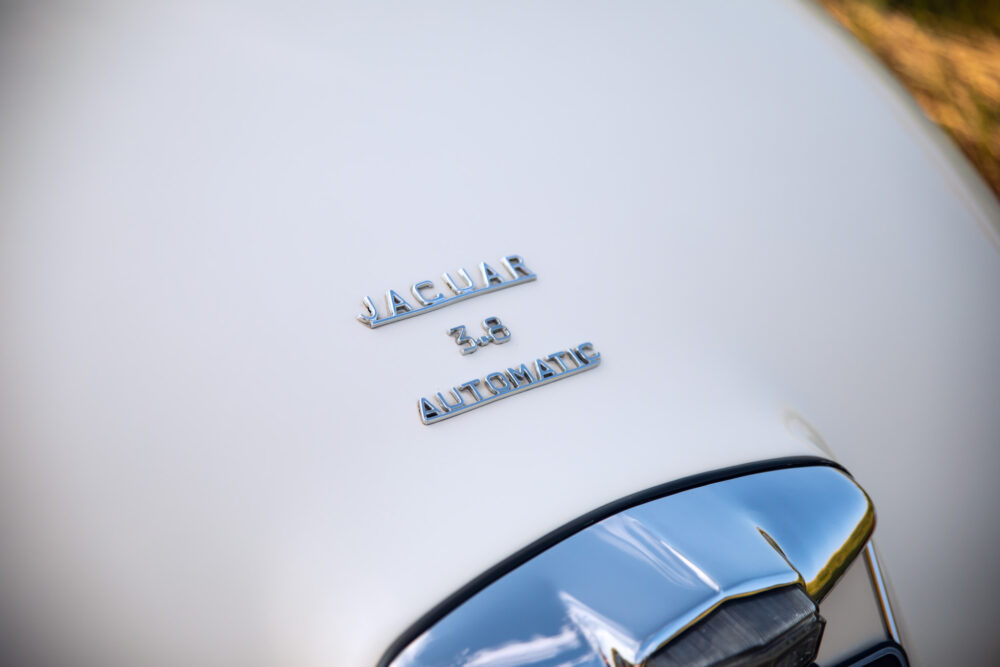 Close-up of Jaguar 3.8 Automatic logo on car
