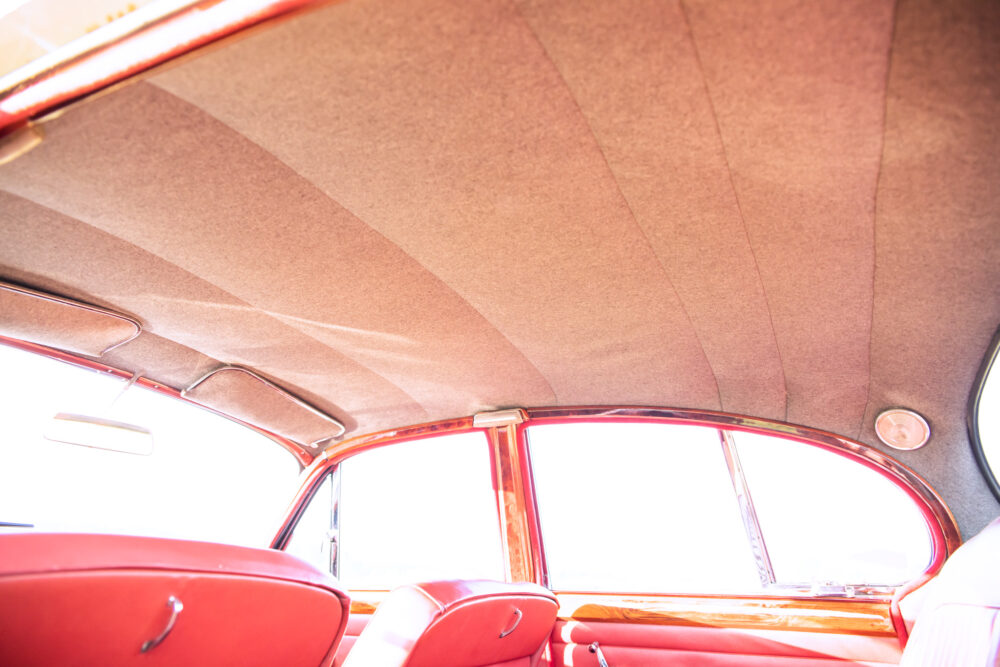 Vintage car red interior and ceiling