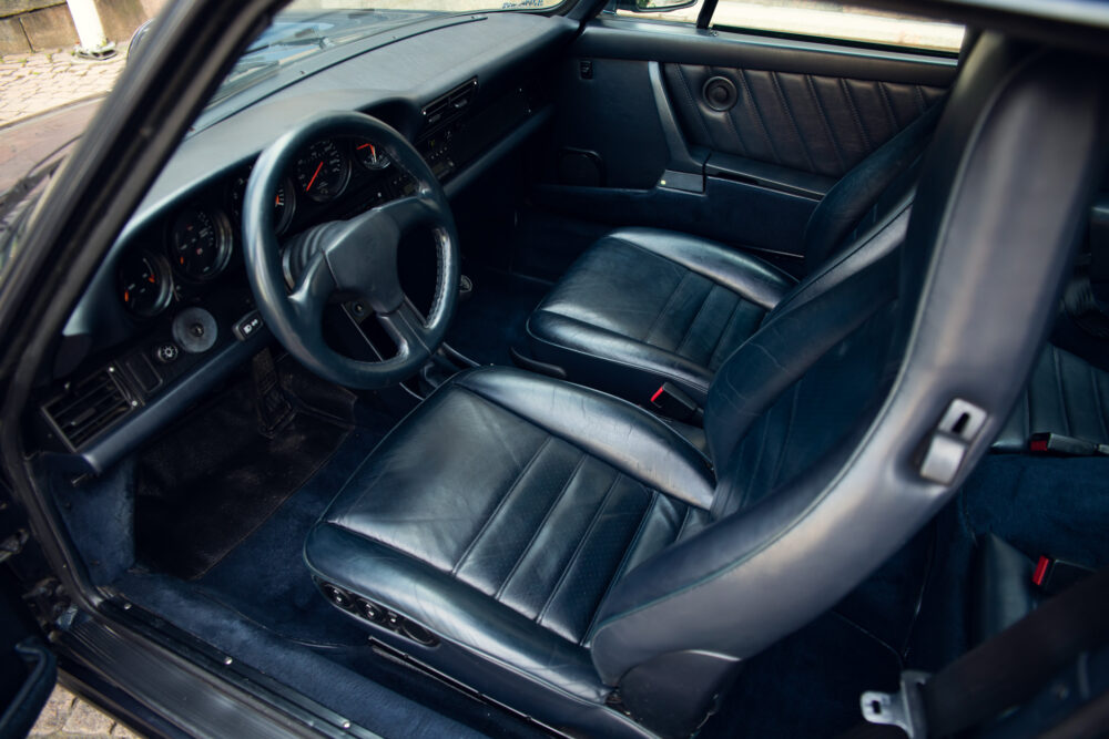 Vintage car interior with leather seats and dashboard