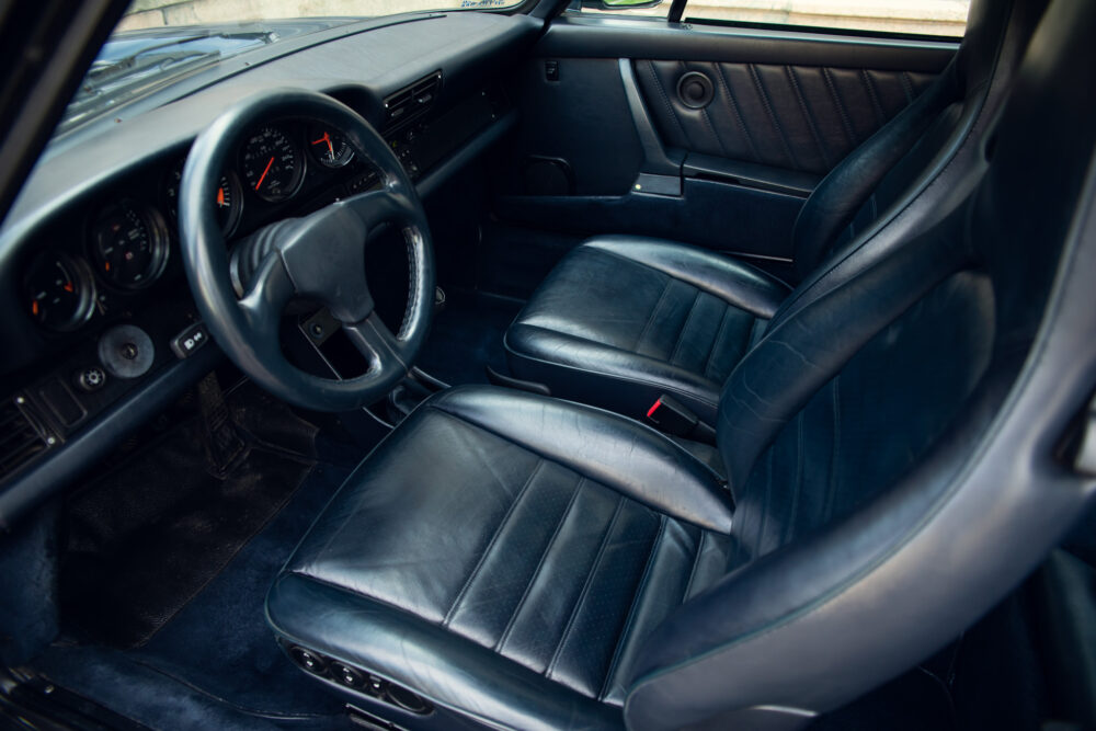 Classic car interior with leather seats and dashboard