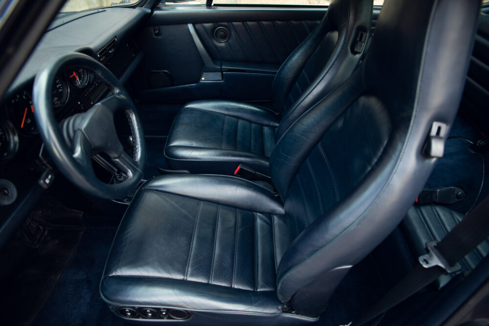 Vintage car's luxurious black leather interior