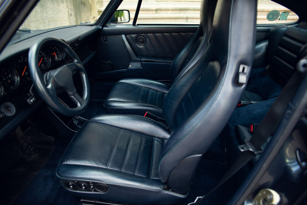 Vintage car interior with leather seats and dashboard