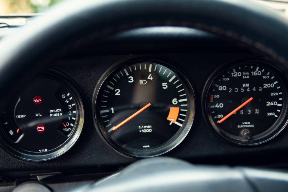 Close-up of car dashboard speedometer and gauges