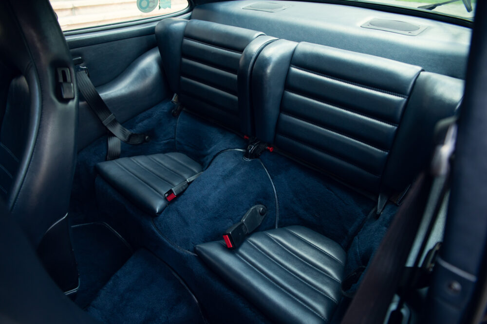 Luxury black leather car interior rear seats
