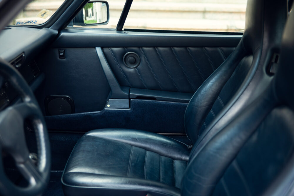 Vintage car interior with leather seats and dashboard
