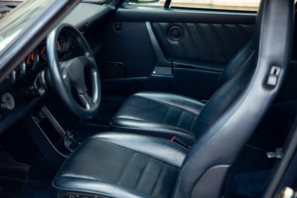 Classic car interior with leather seats and dashboard