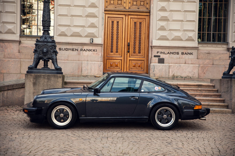Vintage car parked in front of Finland's Bank