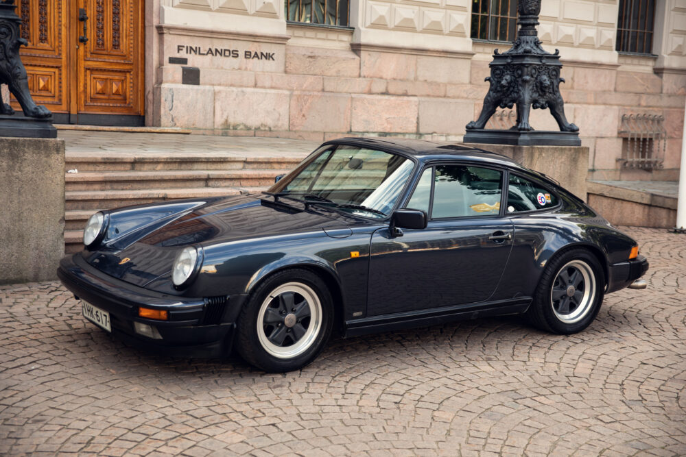 Vintage black Porsche parked outside Finlands Bank