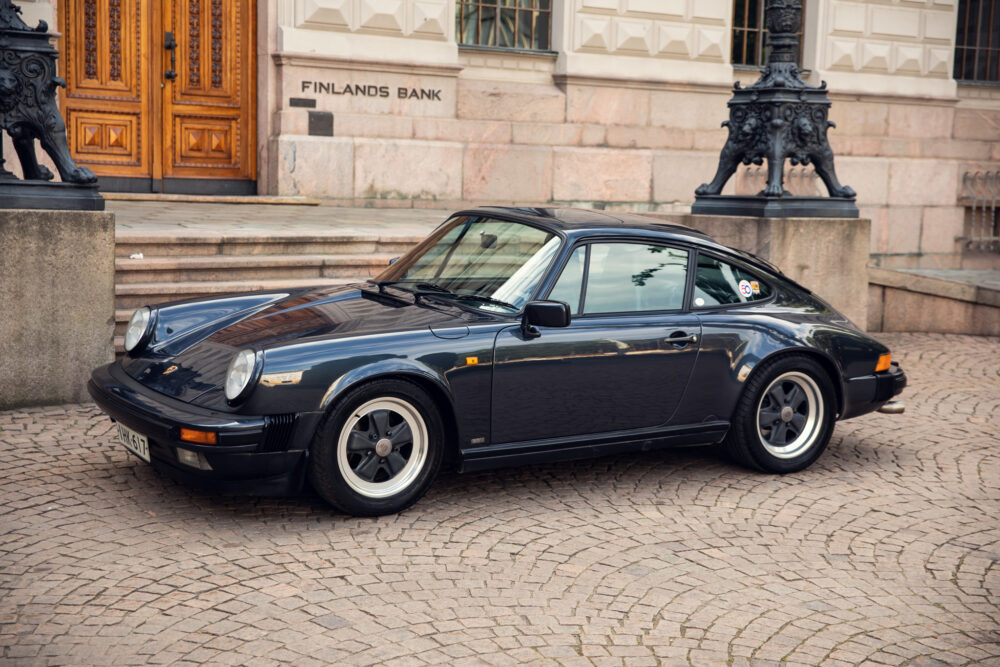 Vintage black Porsche 911 outside Finlands Bank