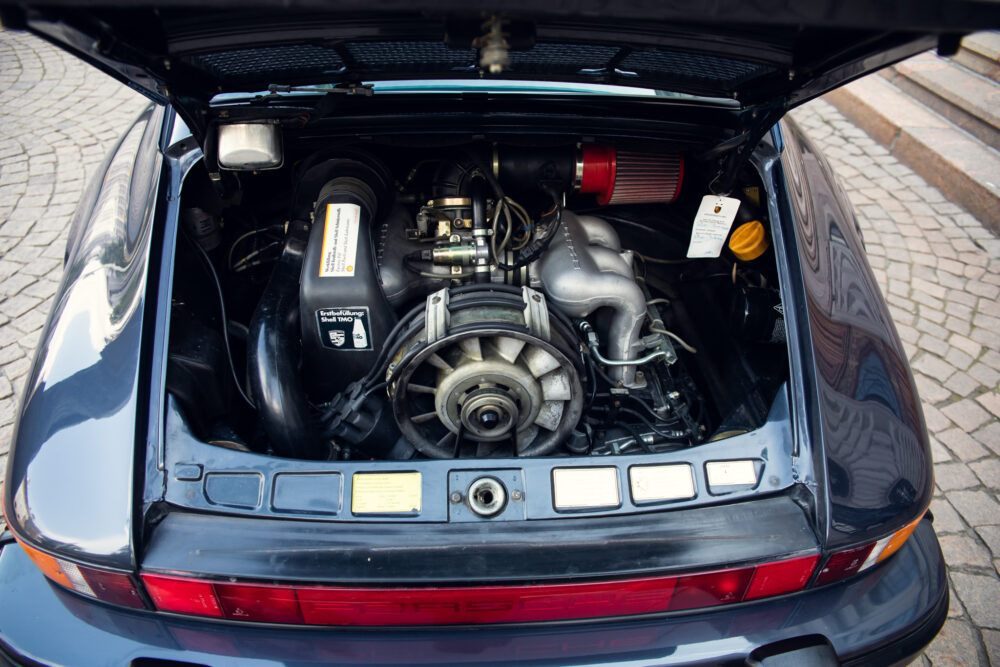 Open trunk showing detailed vintage car engine