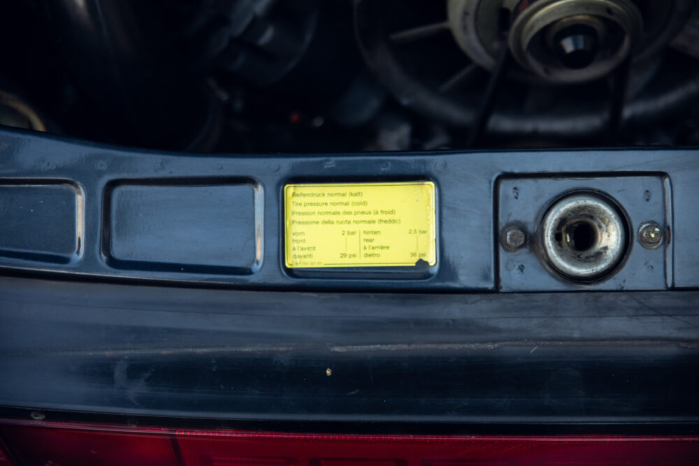 Car tire pressure information label on auto trunk