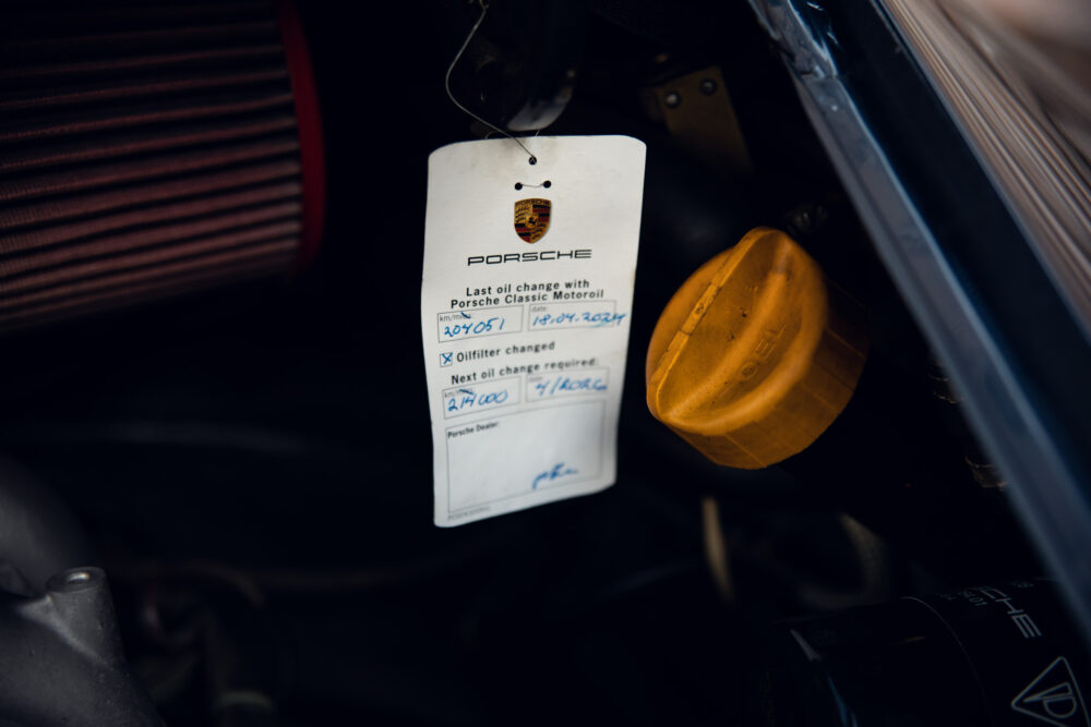 Porsche oil change tag and details in engine bay