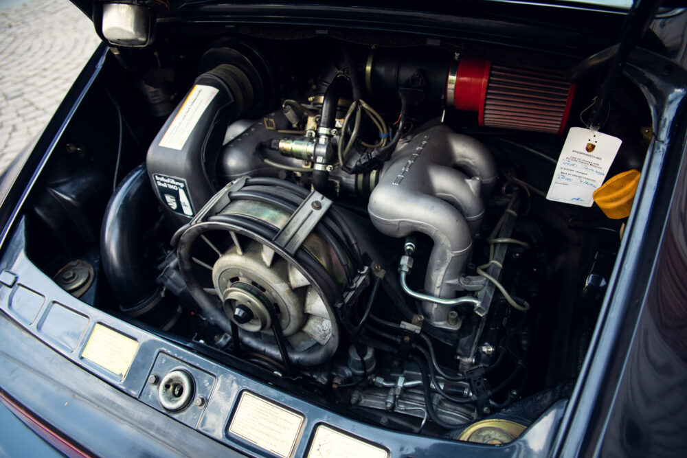 Detailed view of an open vintage car engine