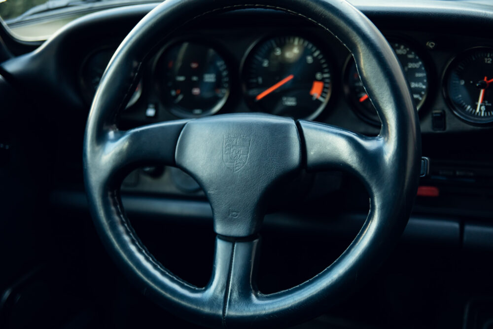 Vintage car dashboard and steering wheel