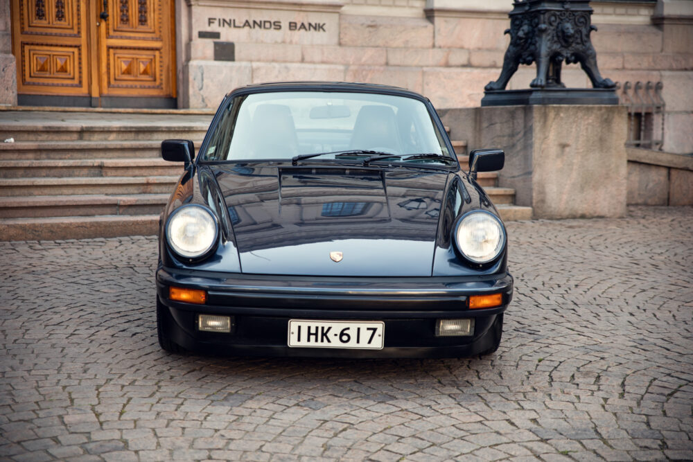 Vintage Porsche in front of Finland's Bank building